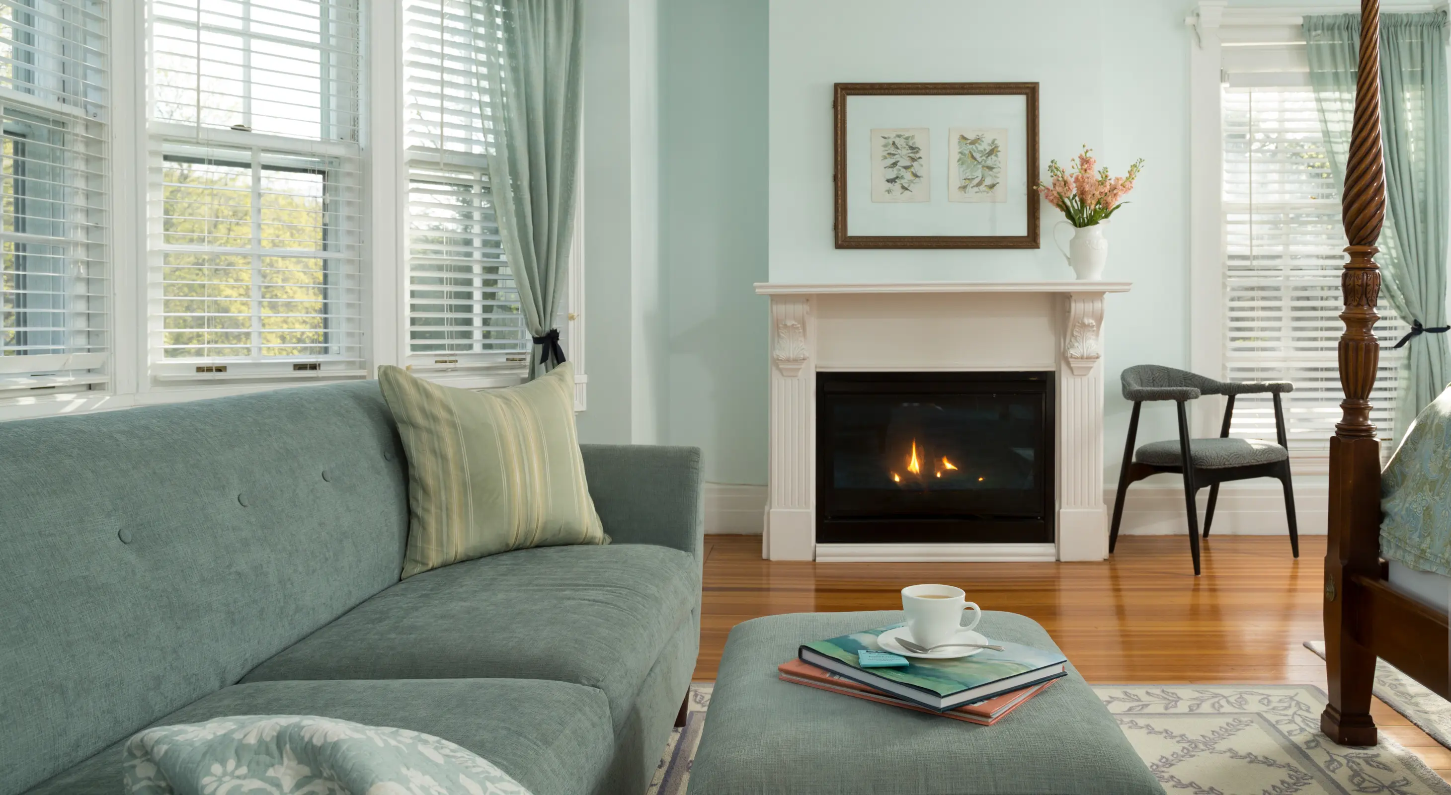 Cozy Vermont lodging with fireplace and elegant decor, offering a serene getaway experience.